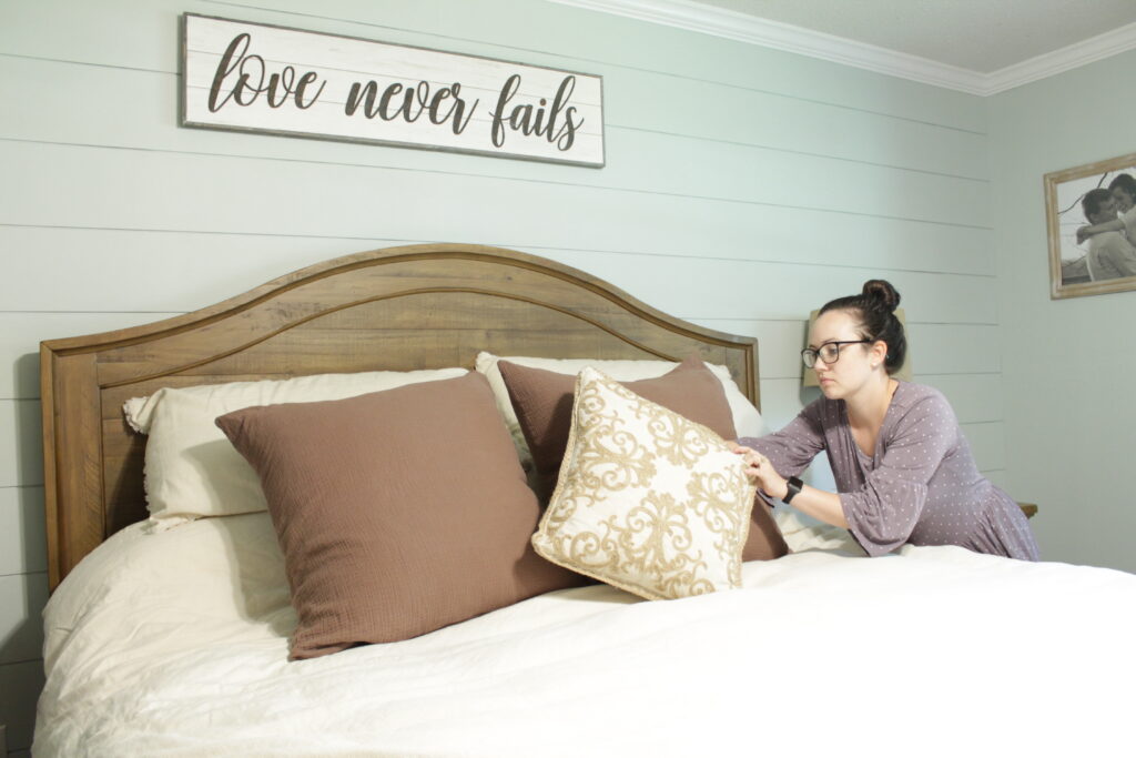 woman making the bed