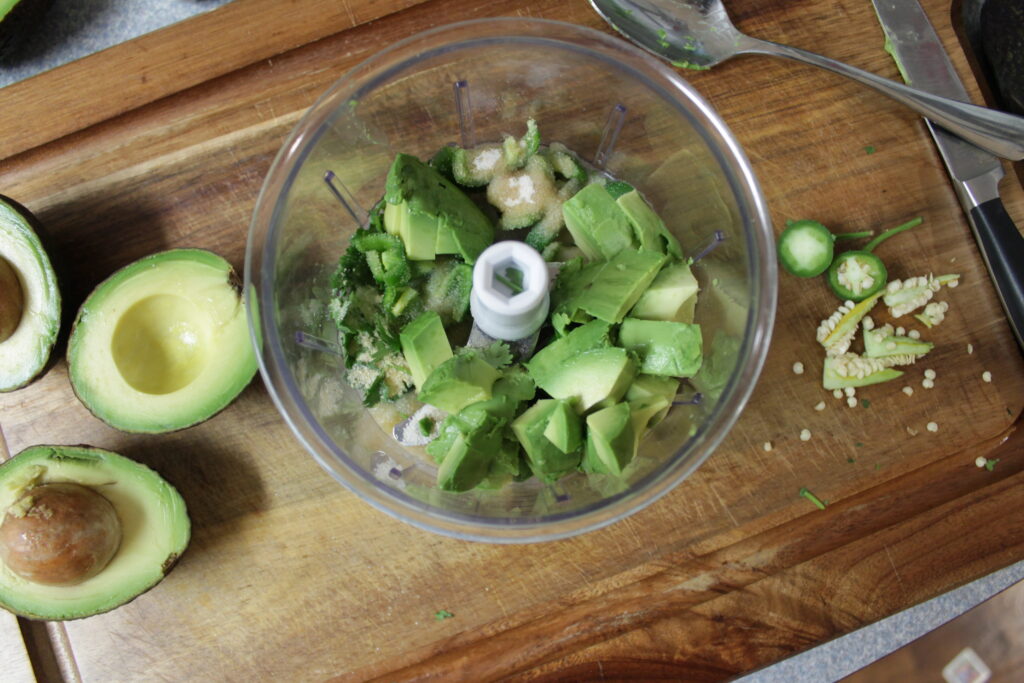 guacamole ingredients inside of food processor
