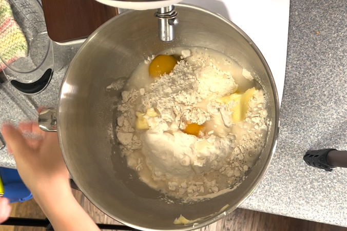 hamburger bun ingredients in stander mixer bowl