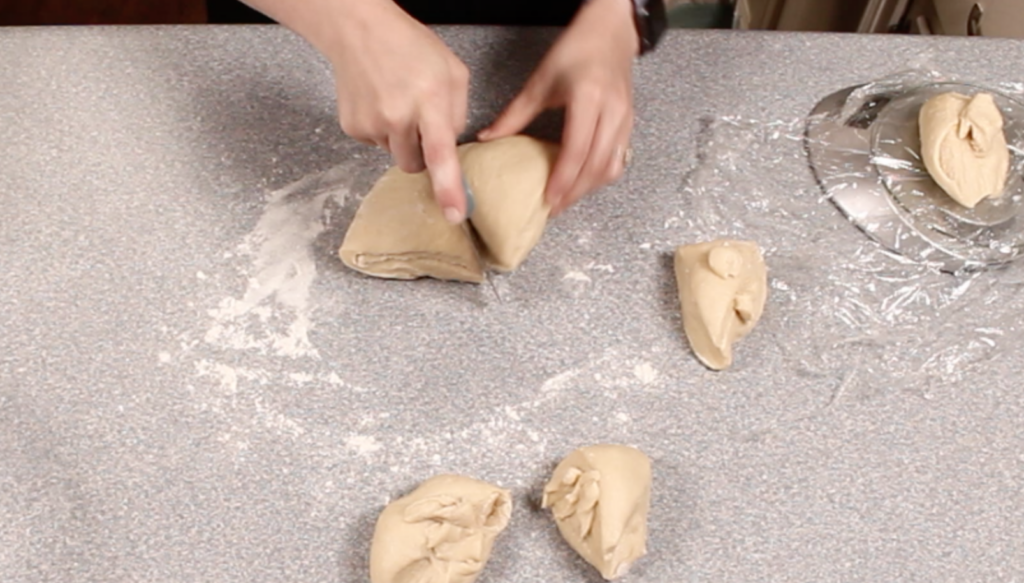 dividing dough with bench scraper