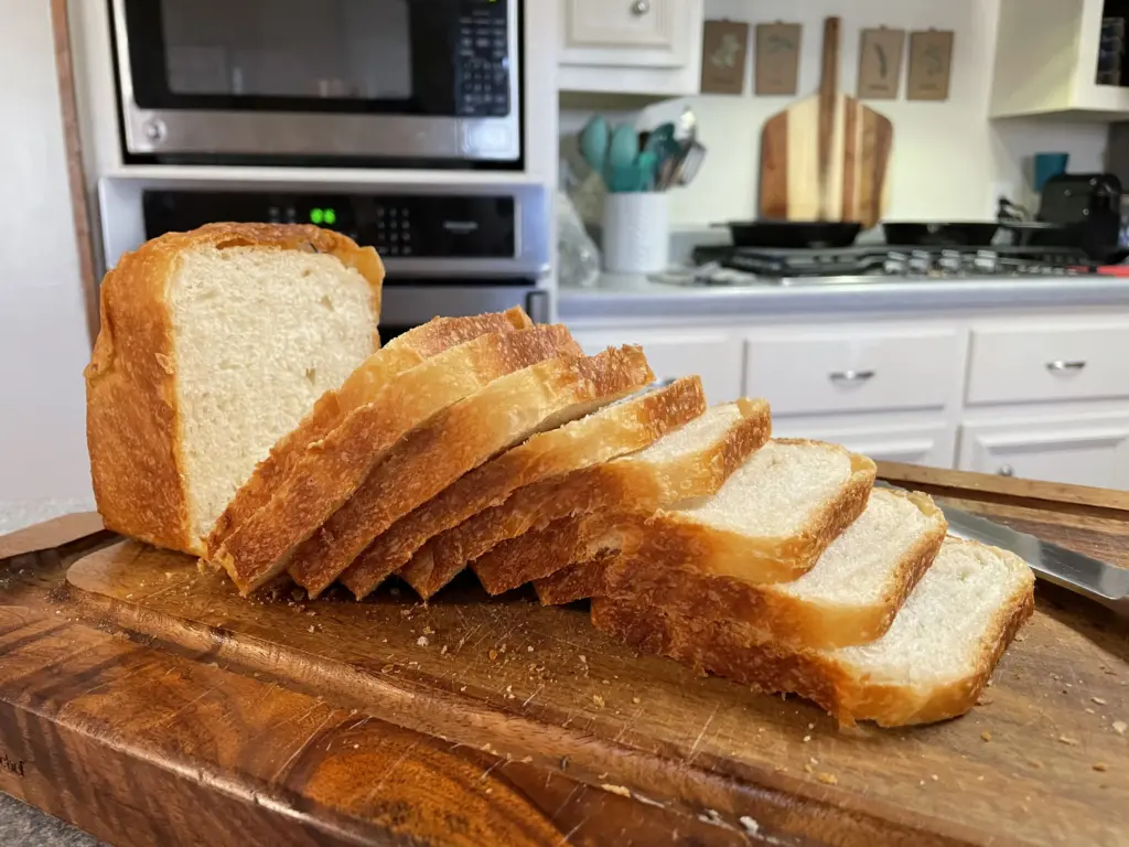 sliced bread loaf on cutting board