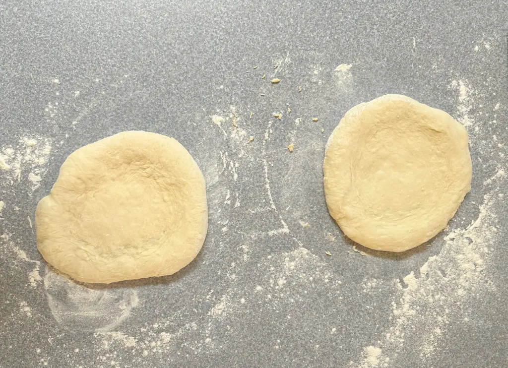 pizza dough divided into two portions