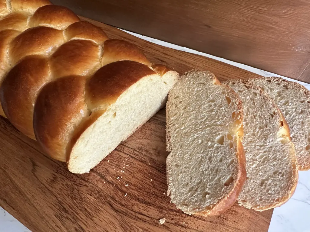 Potato flake sourdough challah bread on cutting board
