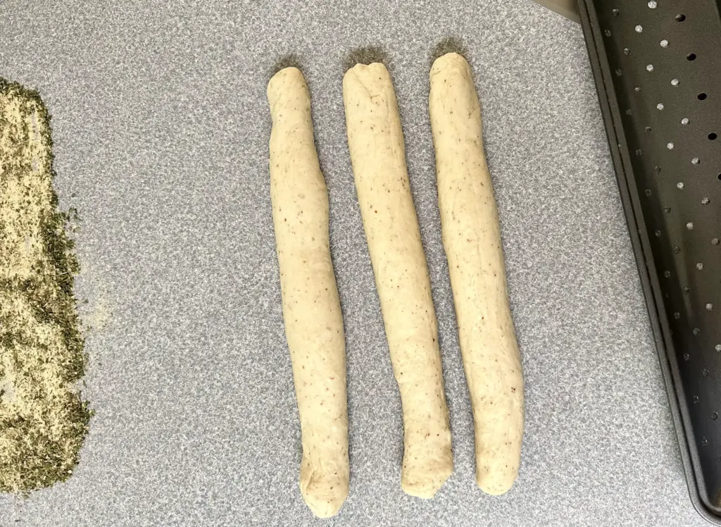 garlic herb and cheese bread rolled into logs