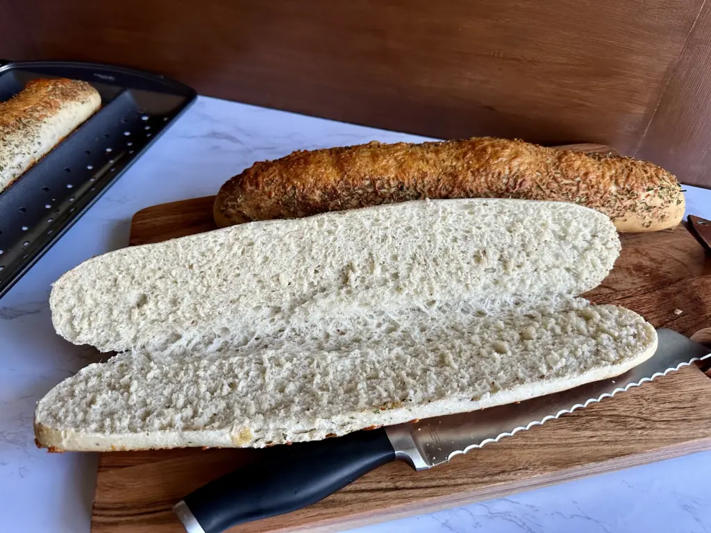 inside crumb of potato flake sourdough garlic herb and cheese bread