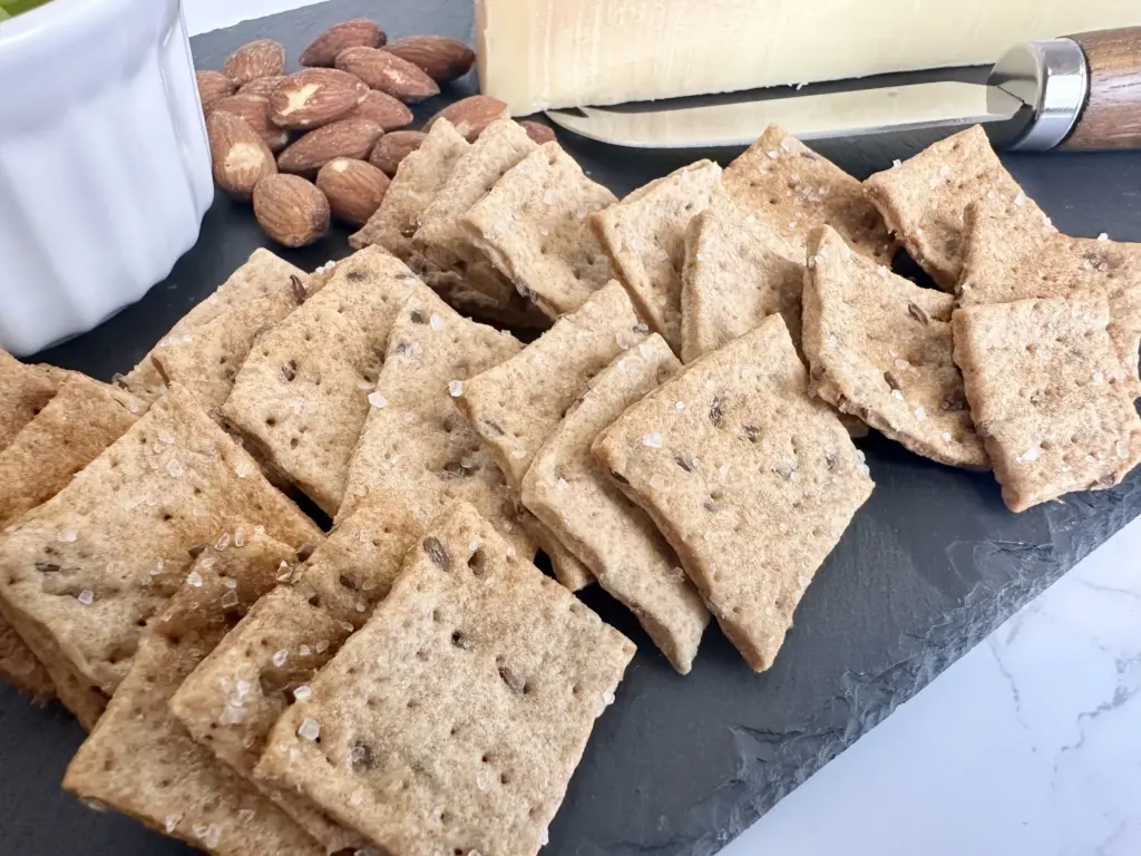potato flake sourdough discard crackers on a charcuterie board