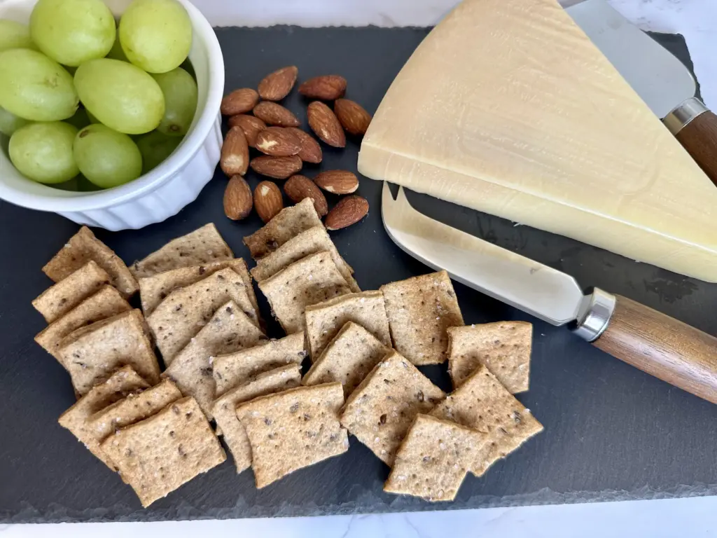 potato flake sourdough crackers served with cheese and grapes