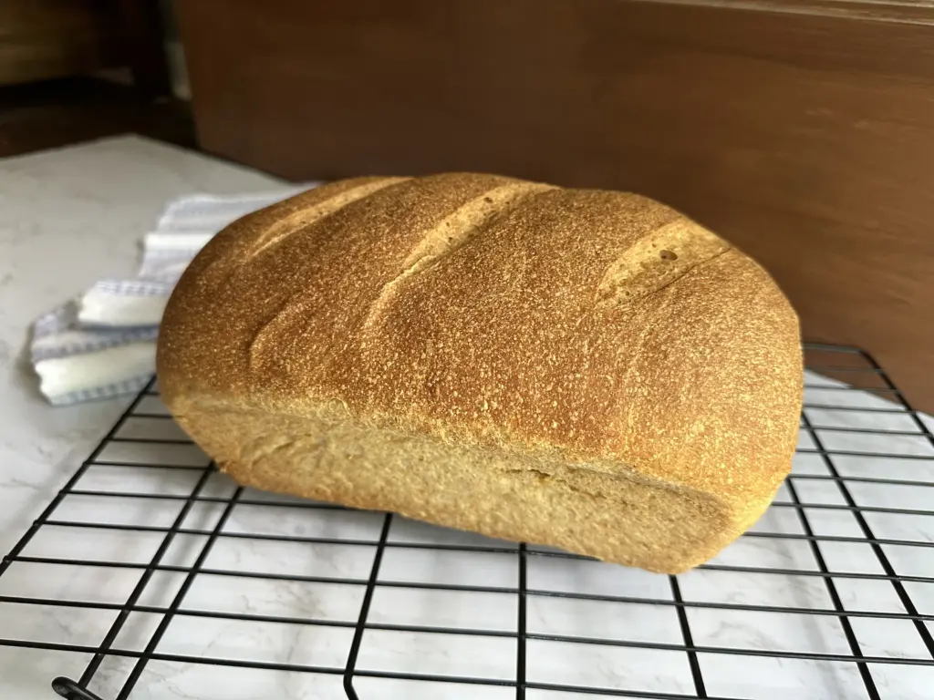 Potato Flake Sourdough Rye Bread cooling on wire rack