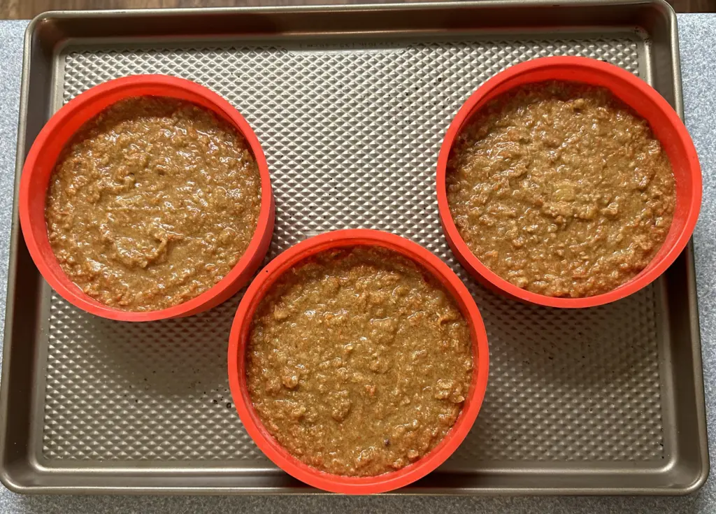 carrot cake batter in pans