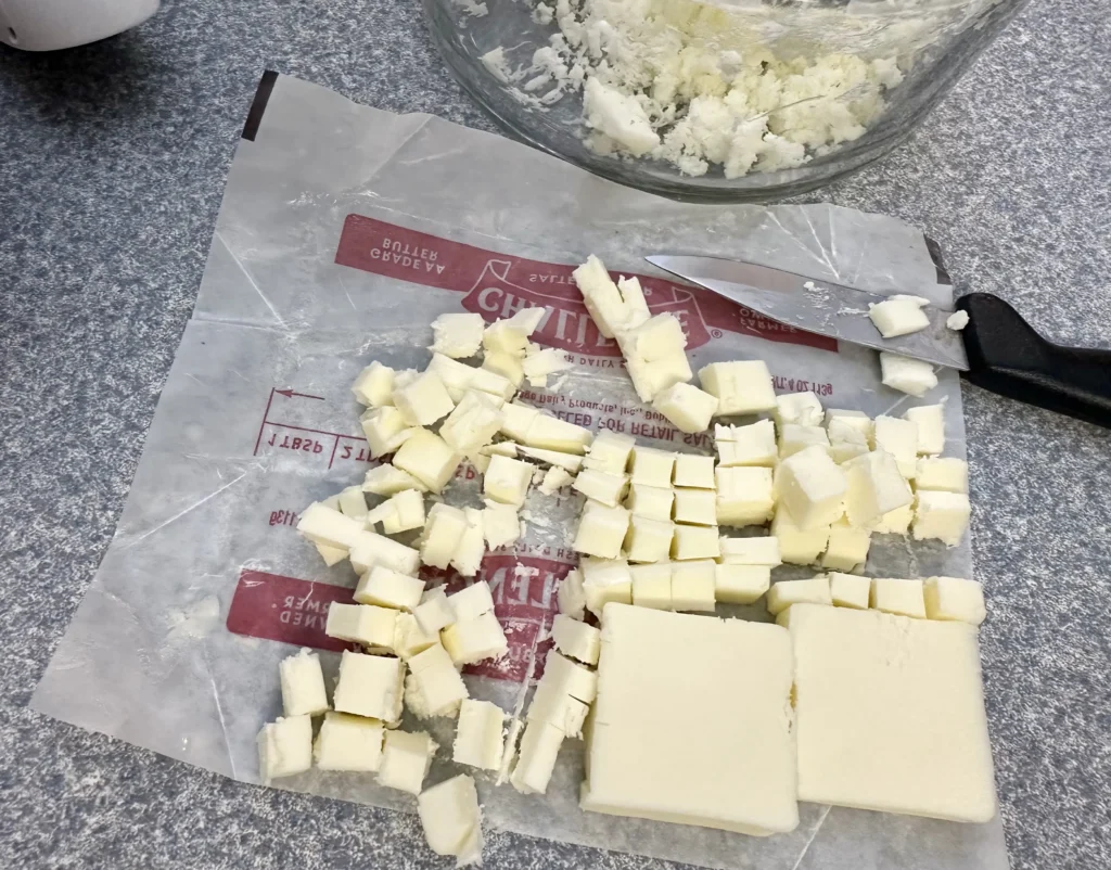 cutting butter into small pieces