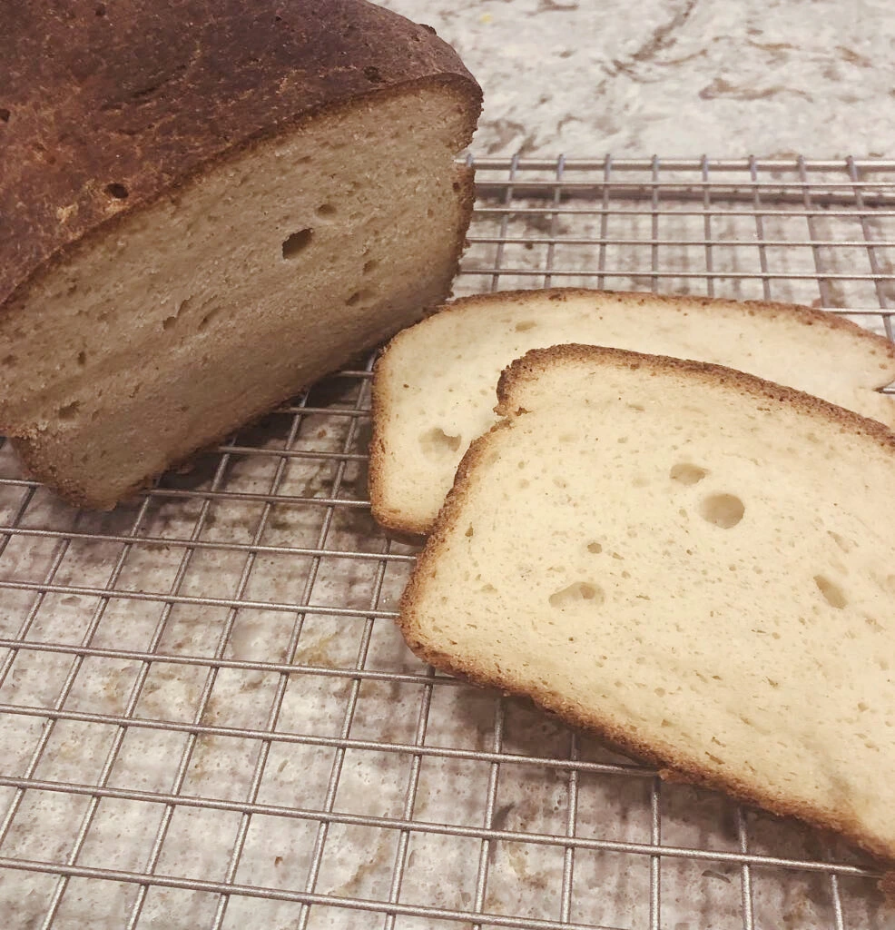 potato flake sourdough gluten free bread on cooling rack 