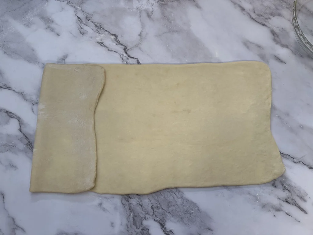 off center fold in laminating potato flake sourdough croissant