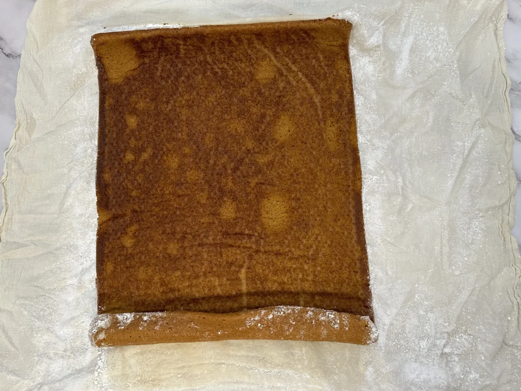 potato flake sourdough pumpkin roll cake unrolled after cooling 