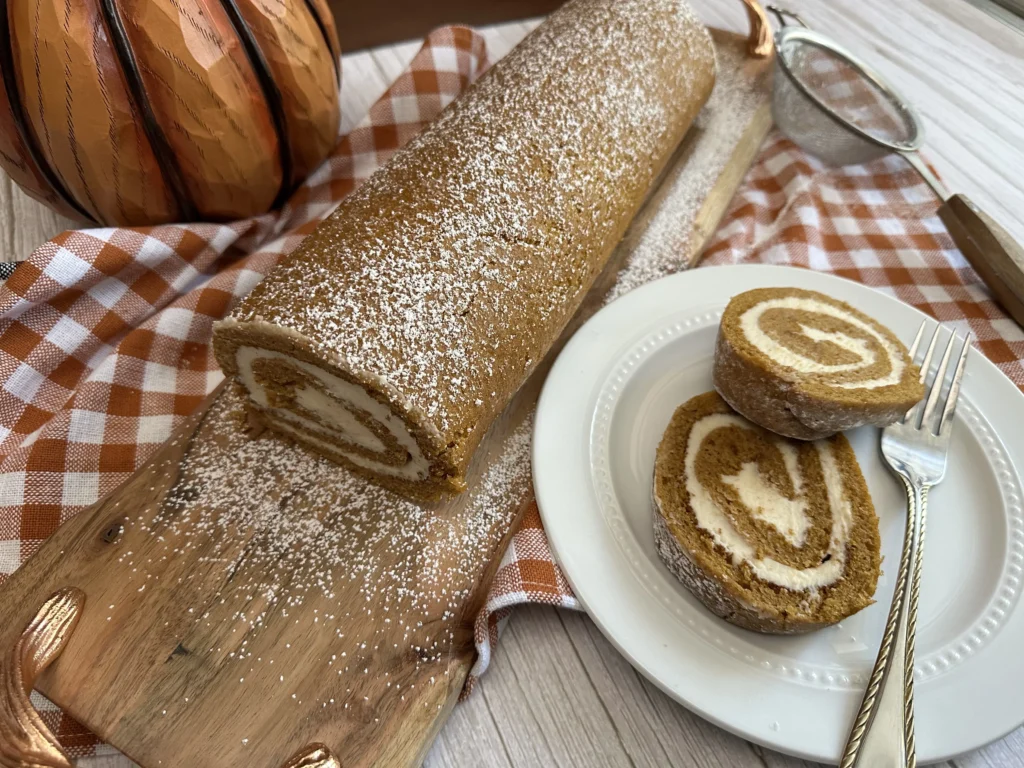 potato flake sourdough pumpkin roll sliced on a plate