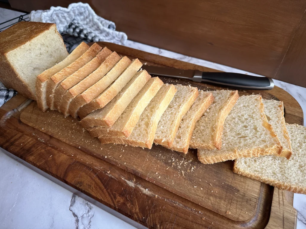 sliced potato flake sourdough bread baked in a pullman loaf pan