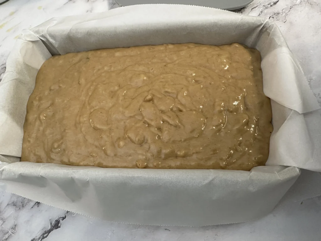 banana bread batter in bread pan