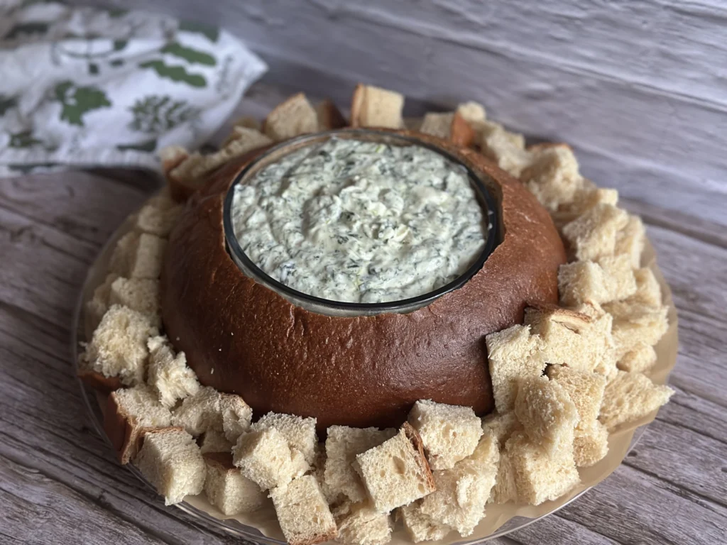 potato flake sourdough Hawaiian bread bowl filled with hot spinach dip