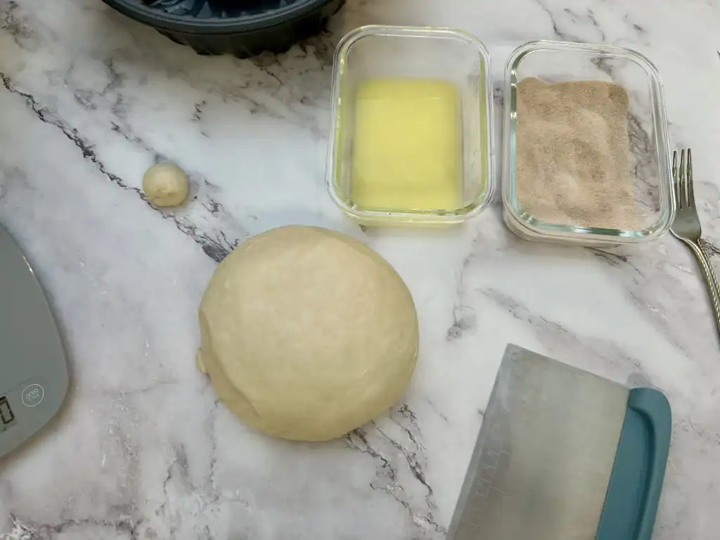butter, cinnamon sugar and dough