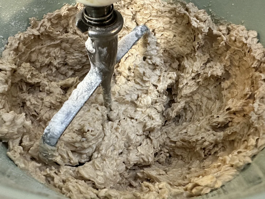 adding dry ingredients to wet ingredients