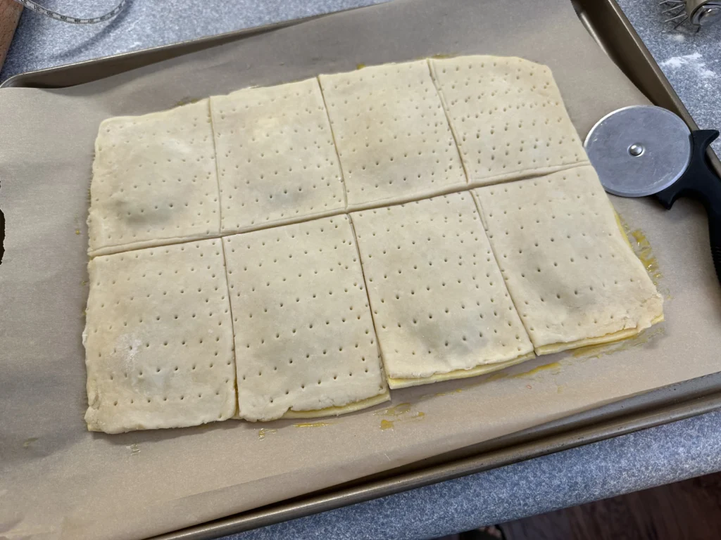 cutting Potato Flake Sourdough Strawberry Pop Tarts apart